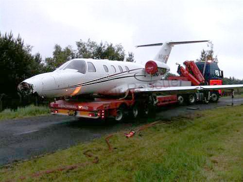 plane on trailer from side
