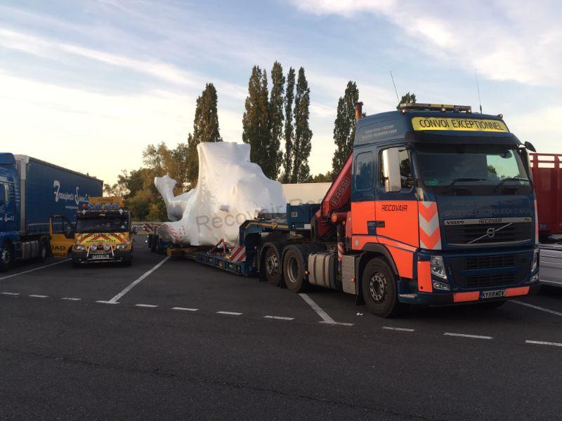 covered aircraft on transport lorry